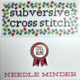 Still Alive Needle Minder
